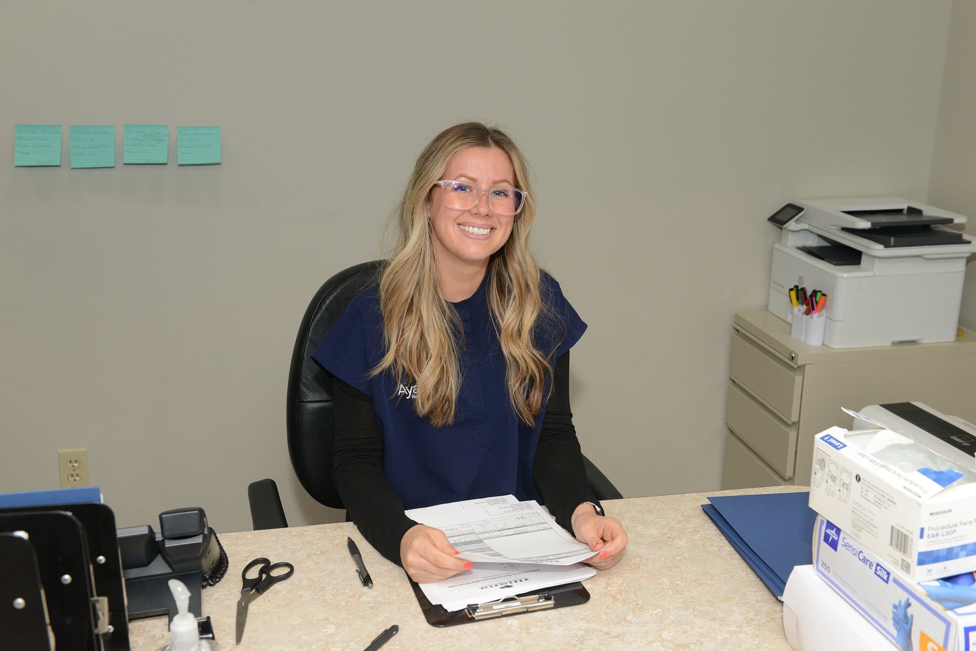 An Illiana patient coordinator at the front desk in Munster, Indiana