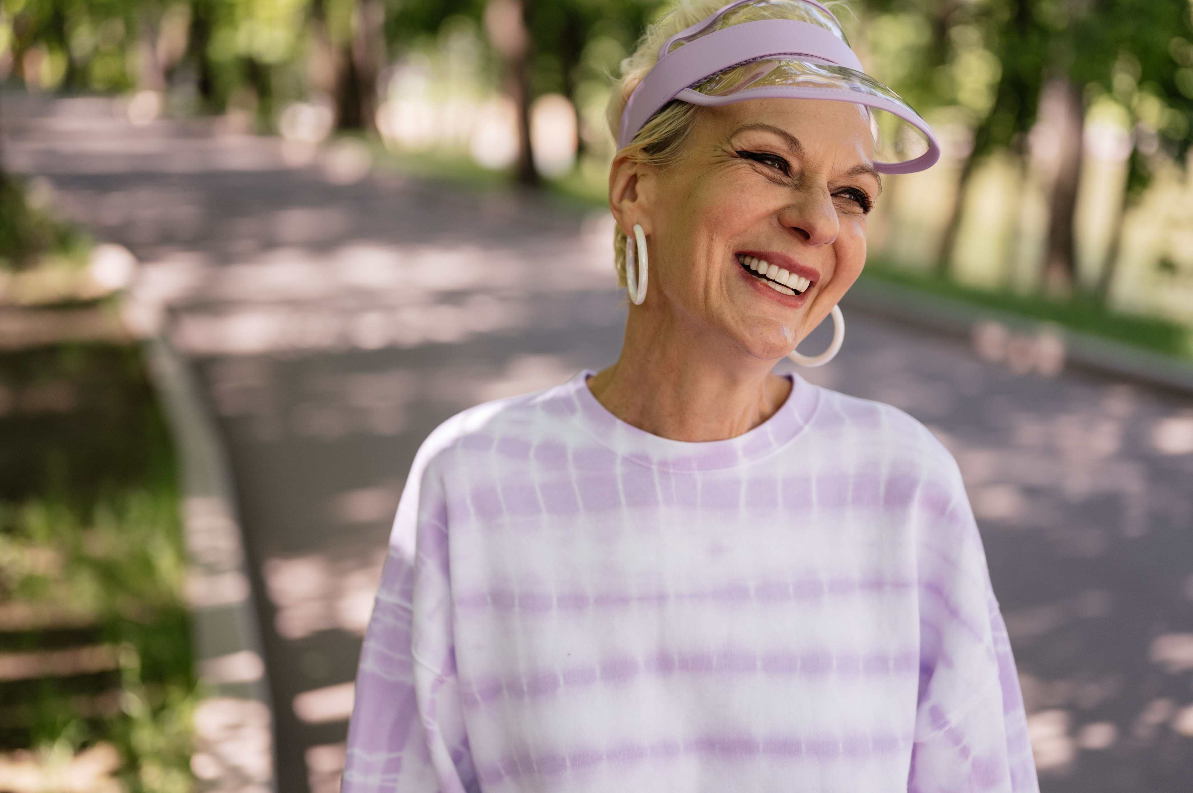 Woman walking outdoors with her legs fully visible